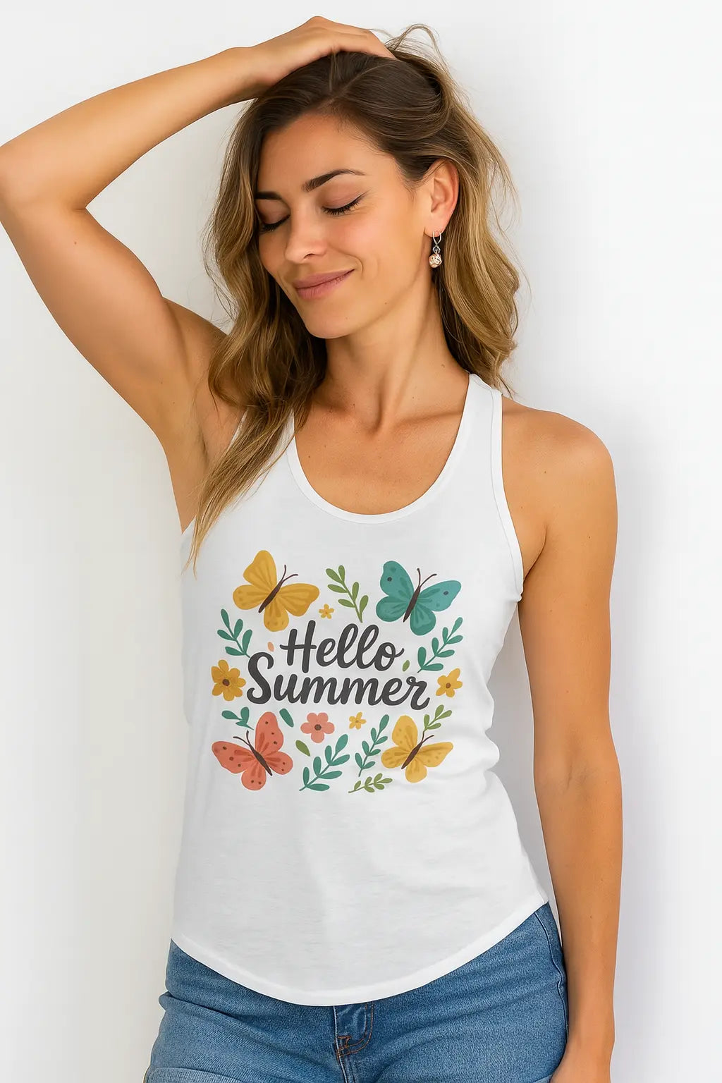 Close-up of summer tank top with butterfly design on smiling model

