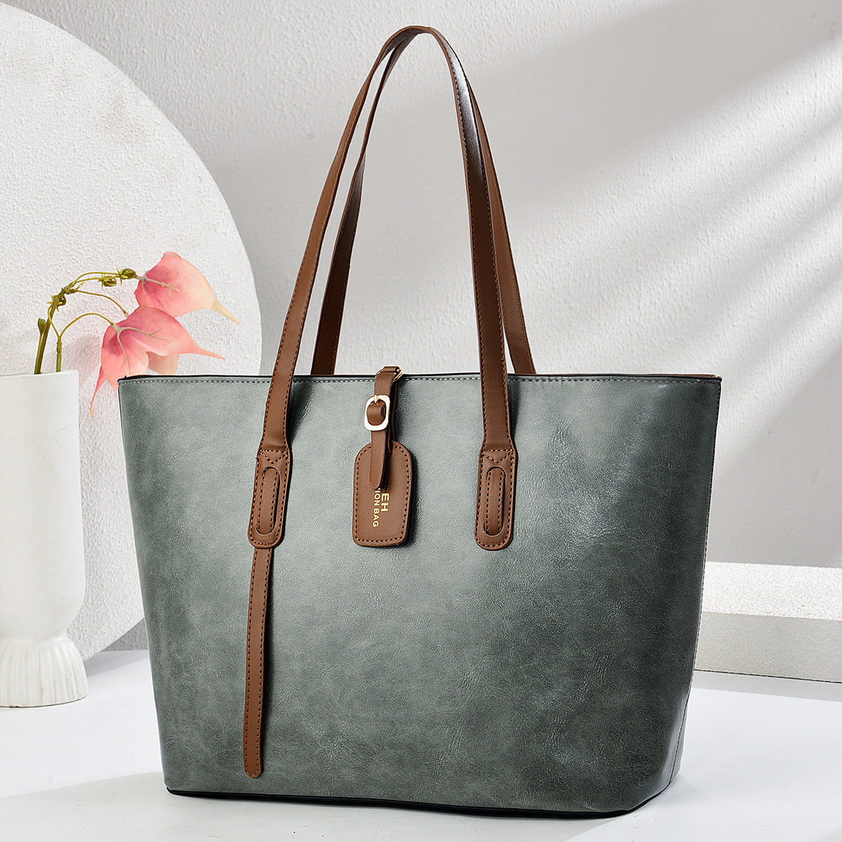 Women's Leather Pattern Shoulder Messenger Bag – structured PU bucket, secure top zip, adjustable crossbody strap