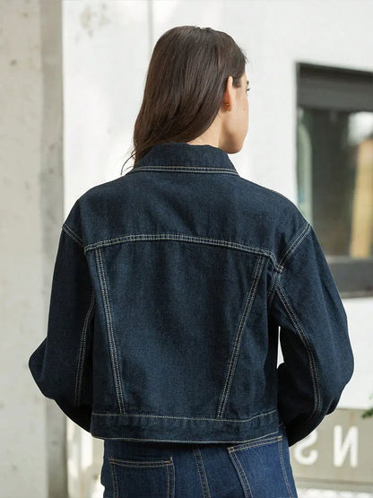 Women’s denim jacket – close-up of buttons and stitchwork