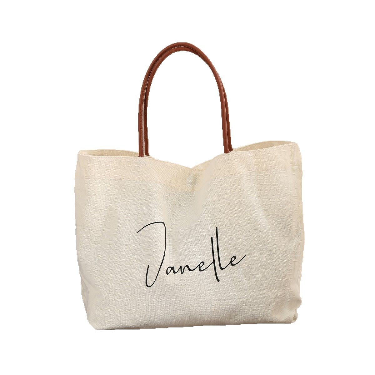 Women’s fashion tote bag – lifestyle shot with work essentials inside