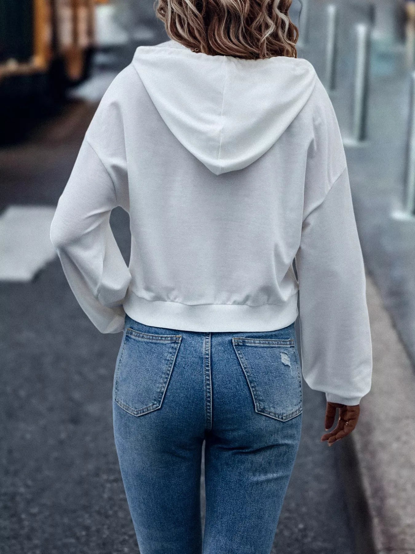 Women’s letter graphic hoodie detail – crisp print close-up and smooth knit