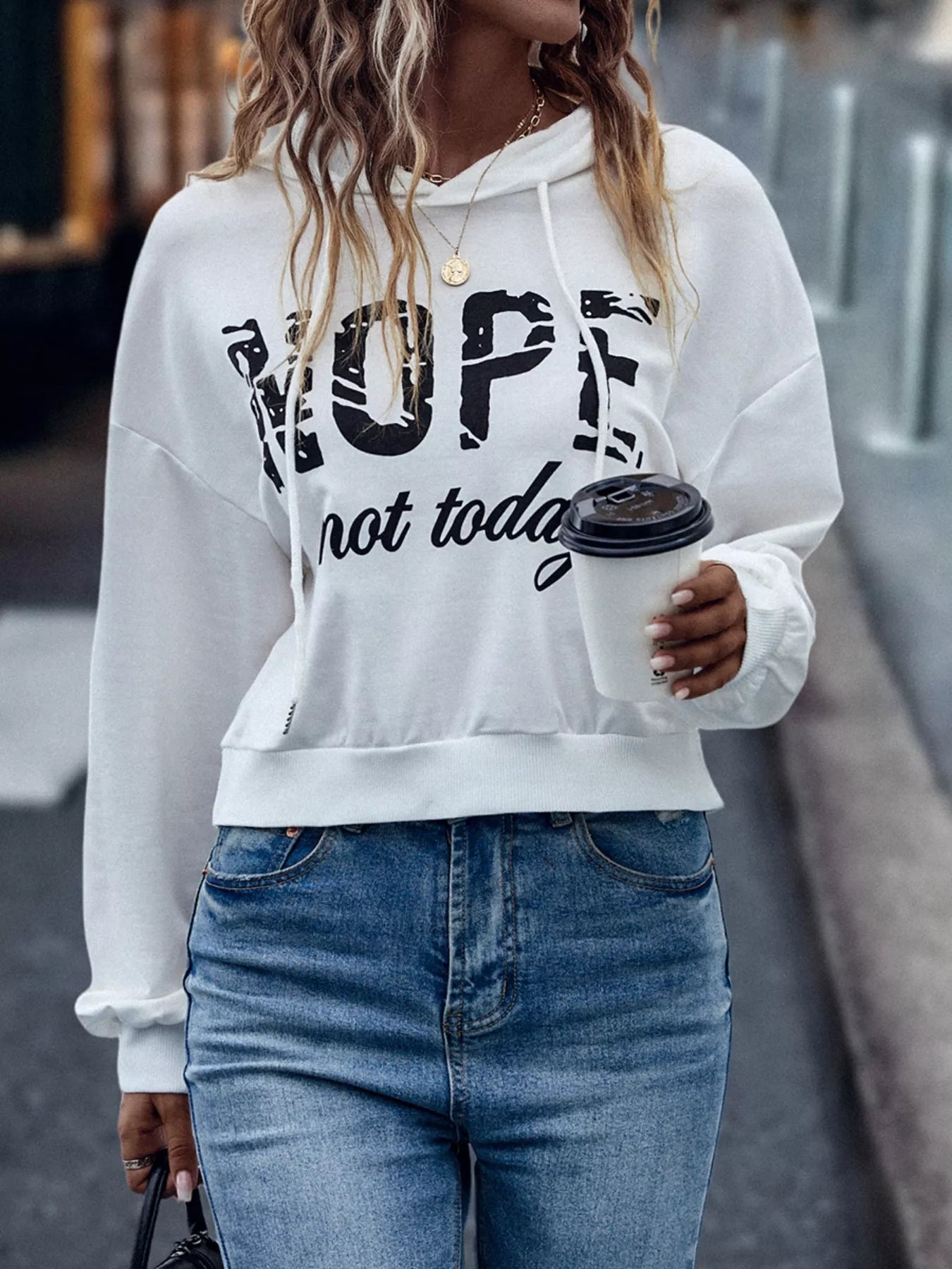 Women’s letter graphic hoodie flat lay – cuffs, hem, and pocket stitching