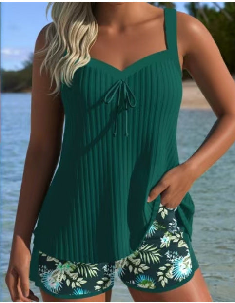 Women’s swimsuit with shorts – modest coverage, vibrant coral/pink/blue prints, active fit