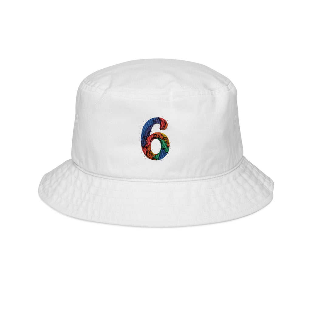 Youth Trucker Cap Hanging from Park Bench Rail

