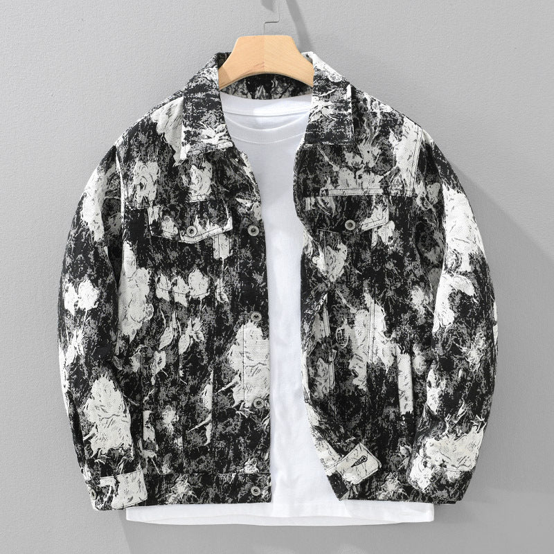 Black and white floral patterned jacket on a mannequin against a gray background