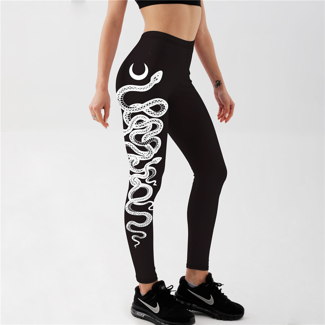 "Witchy moon and snake yoga leggings in black with bold side print, tight fit workout tights for pilates and gym"