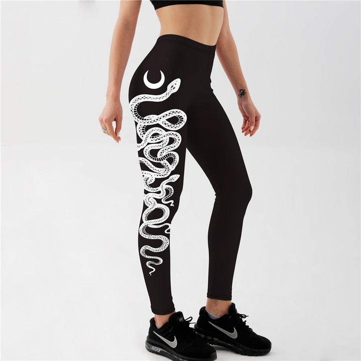 "Witchy moon and snake yoga leggings in black with bold side print, tight fit workout tights for pilates and gym"
