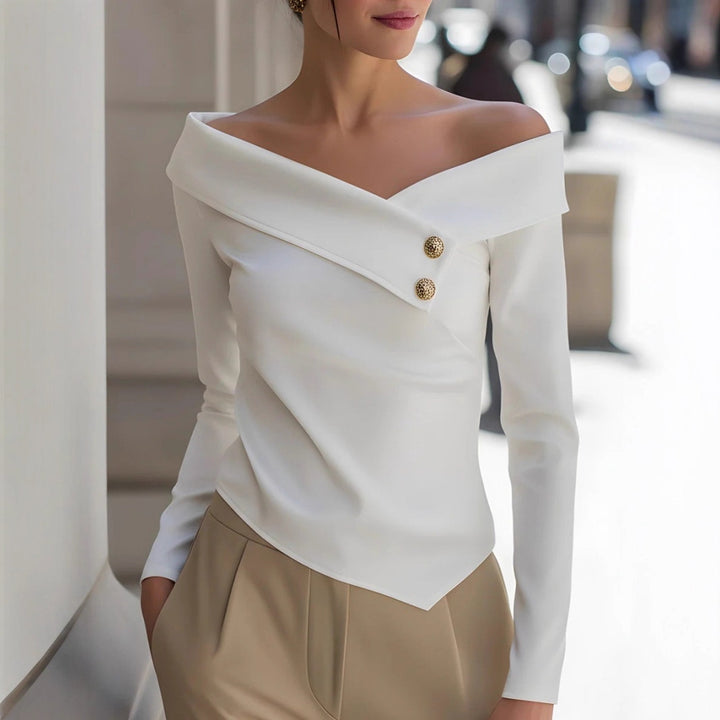 off shoulder long sleeve shirt long sleeve drape detail highlighting clean finish and refined stitching indoors