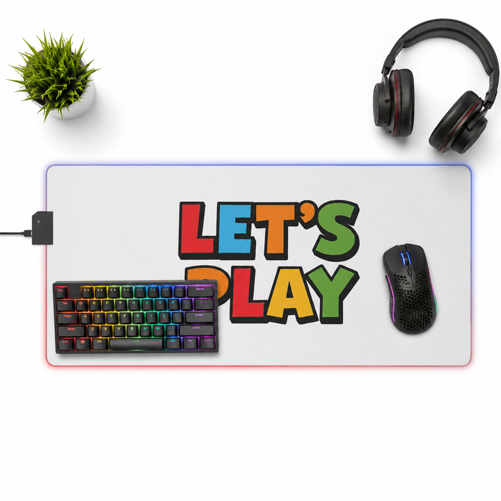 Large LED gaming mouse pad arranged on a desk with vivid RGB edge lighting for a more personalized gaming or streaming setup.
