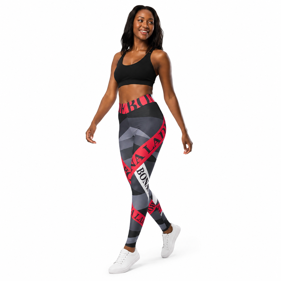 Printed yoga leggings with alphabet design shown from the side, high waist styling and sizes S through XL for product review.
