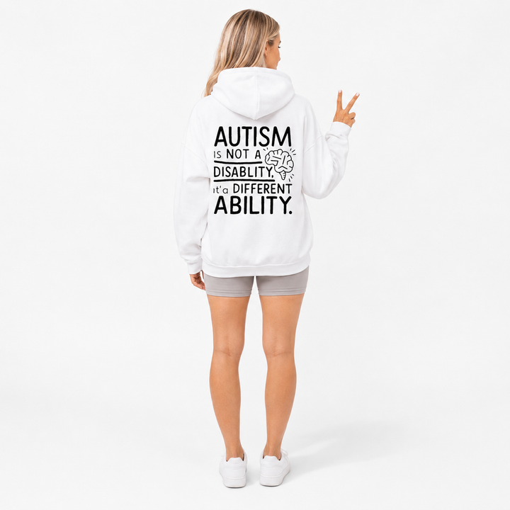 Autism awareness hoodie in Pure White shown from the back on an adult model with the statement graphic fully visible.