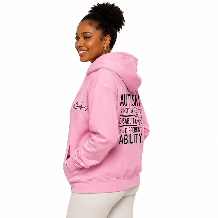 Autism awareness hoodie in Soft Pink shown in a side and three-quarter view on an adult model with chest and back graphics visible.