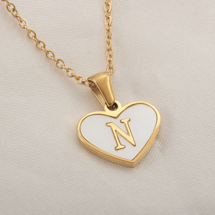 Heart-shaped letter necklace with 45+5 cm chain, stainless steel construction and gold-plated finish - For product selection.