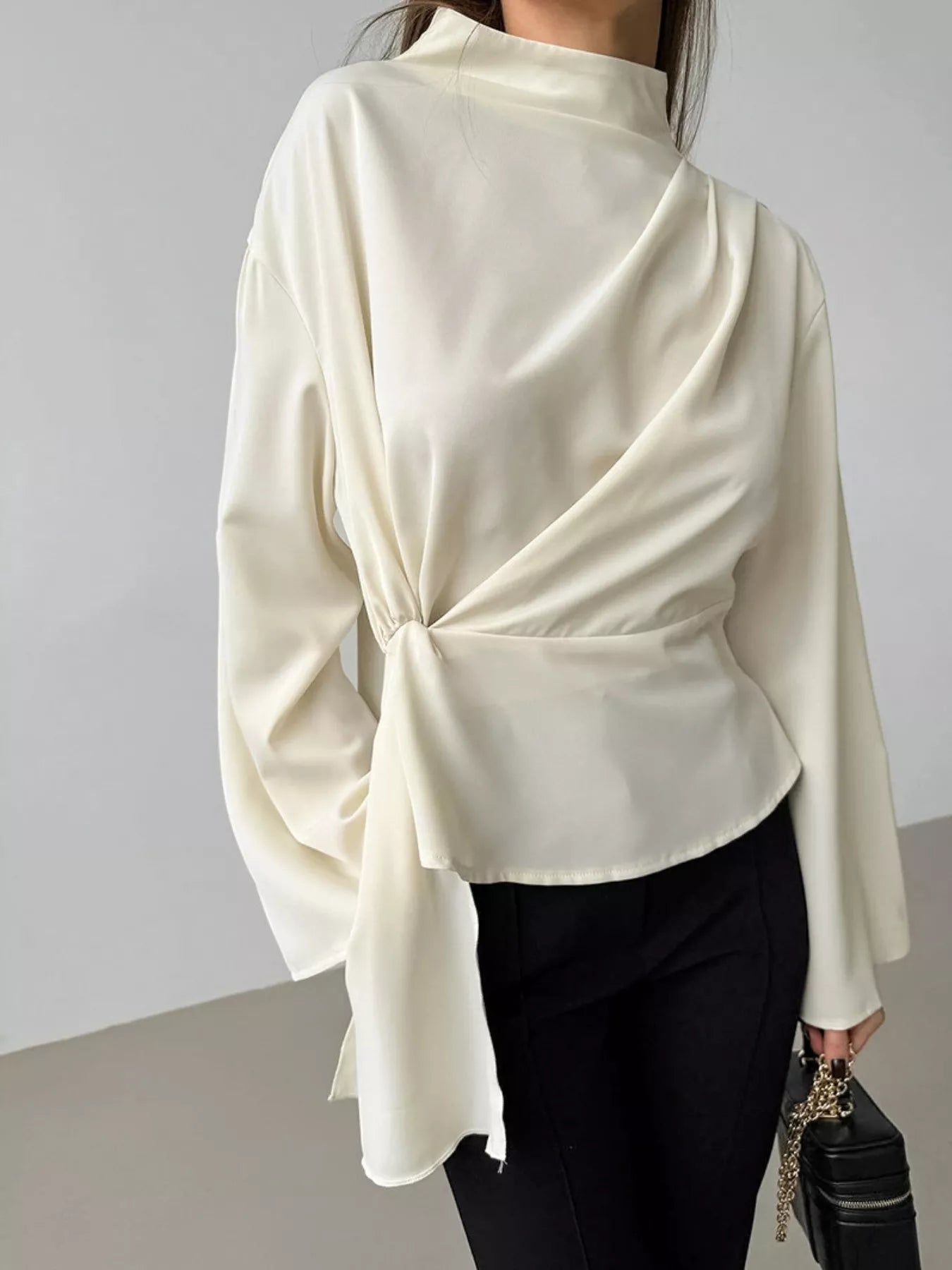Zipper blouse for women ruched mock neck top side view highlighting sculpted ruching and clean neckline finish
