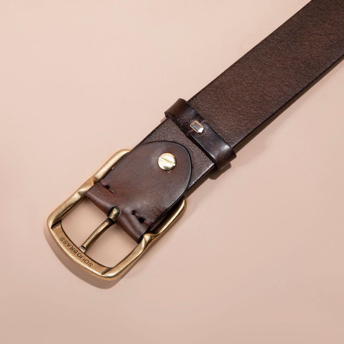 men genuine leather belt brass buckle worn with beige trousers premium casual outfit