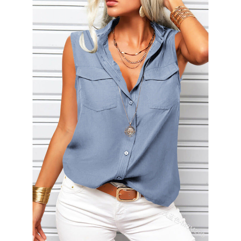 Woman wearing a sleeveless denim shirt with white pants against a light background