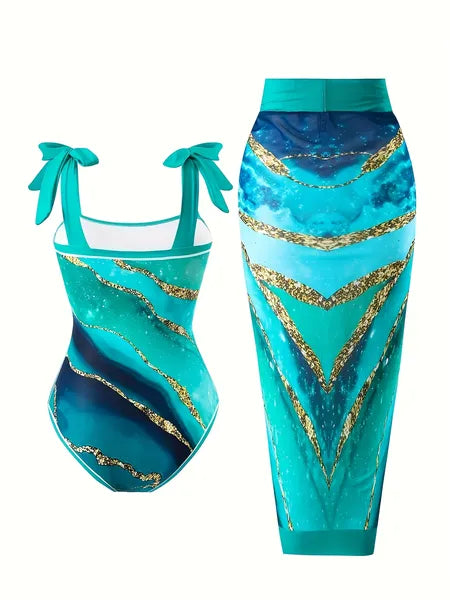 One-piece swimsuit with premium print detail, scoop neck, flattering ruched front
