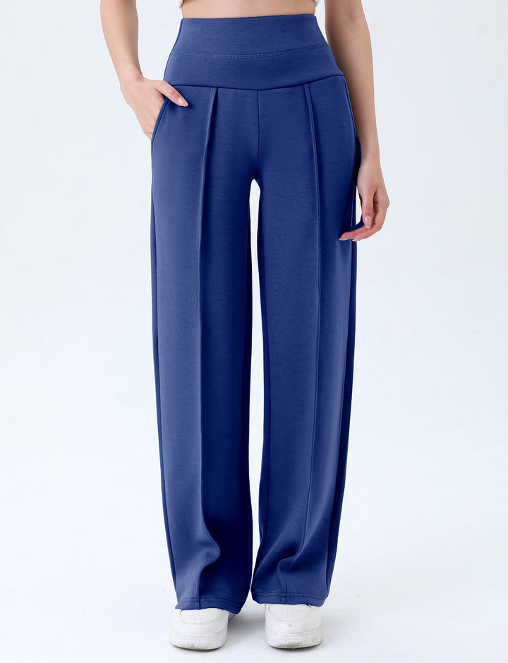 Supplier front view of blue athletic trousers with the broad stitched waistband, curved side pockets and loose straight legs.