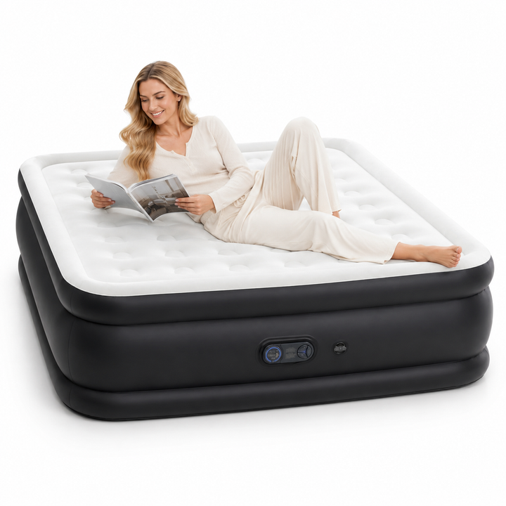 Raised inflatable air bed with built-in pump styled with white bedding for guests