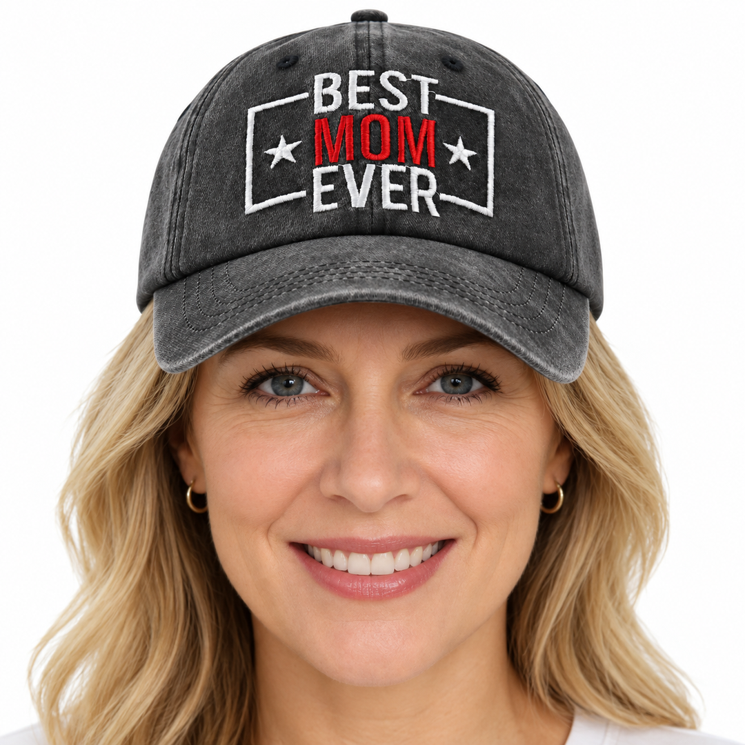 Woman wearing Best Mom Ever adjustable hat in washed black with embroidered red and white front design
