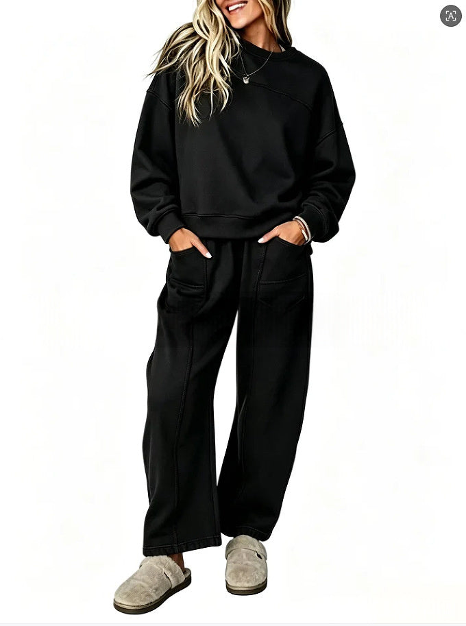Original supplier model photo of the black sweatshirt and wide-leg trouser set