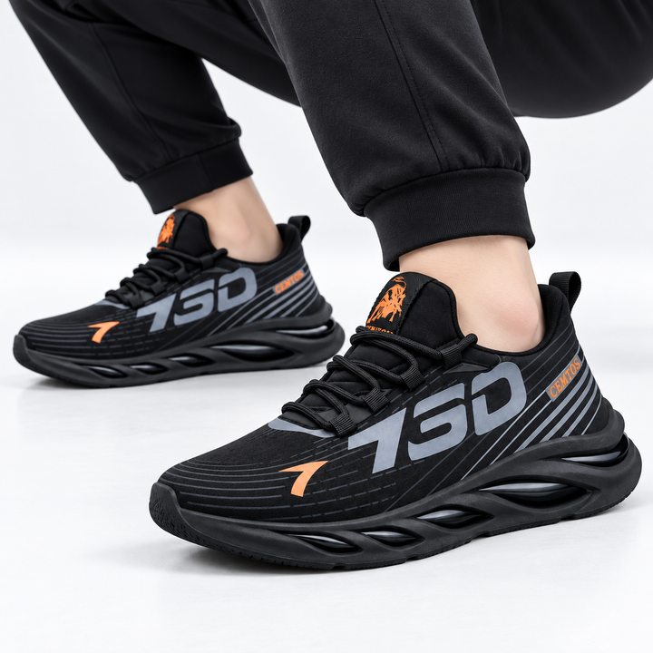 Pair of black athletic-style shoes from front angles showing lace-up design and molded outsole