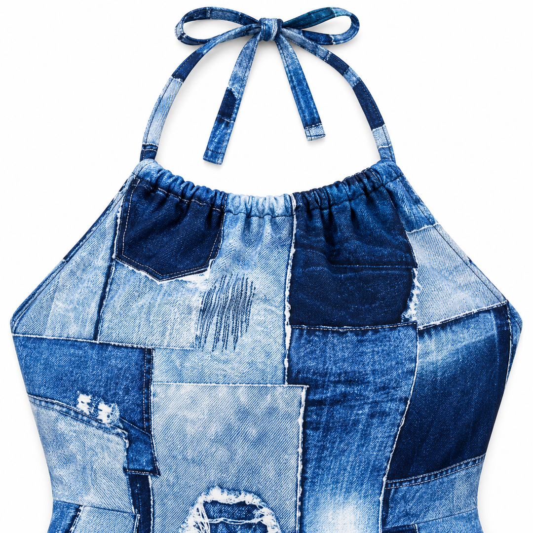 Close-up of the blue patchwork dress neckline, printed panels and halter construction.