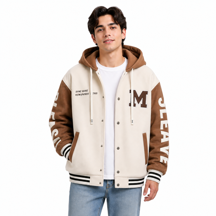 Cream and brown colorblock hoodie jacket shown on male model with hood, snap buttons and striped cuffs on white