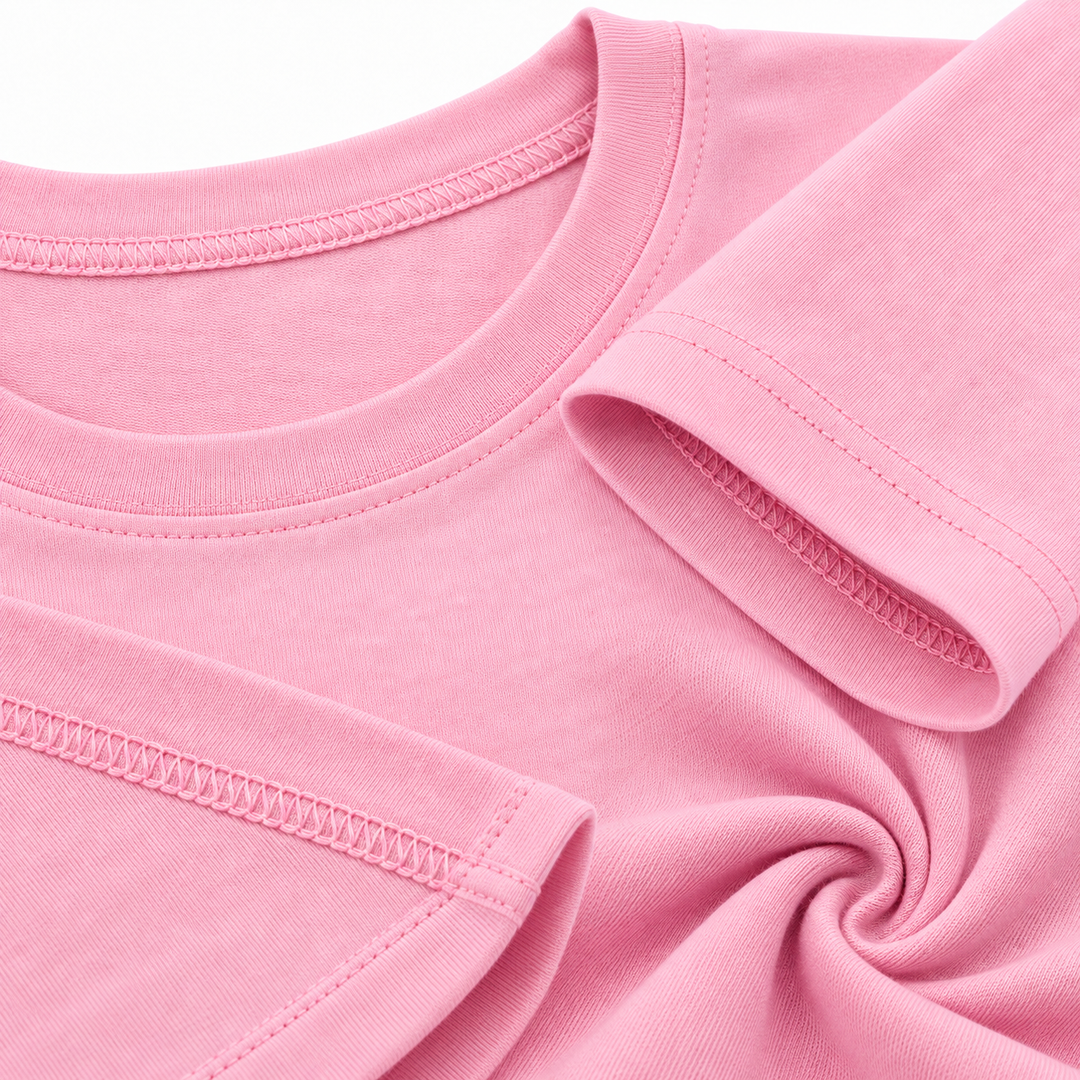 Pink graphic tee neckline sleeve stitching and fabric detail