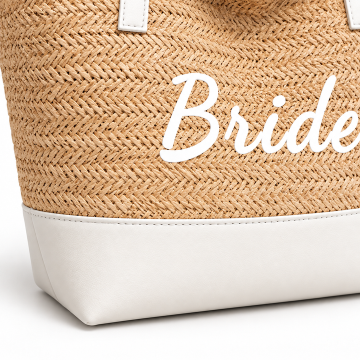 Close-up of Bride woven tote lower front, woven texture, stitching and white base panel