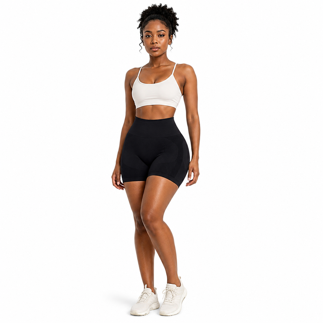 Black butt lifting yoga shorts front view on female fitness model
