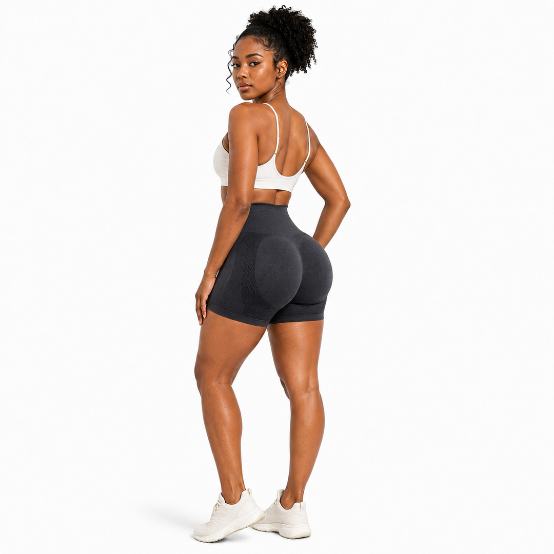 Charcoal butt lifting yoga shorts three-quarter back view on female model