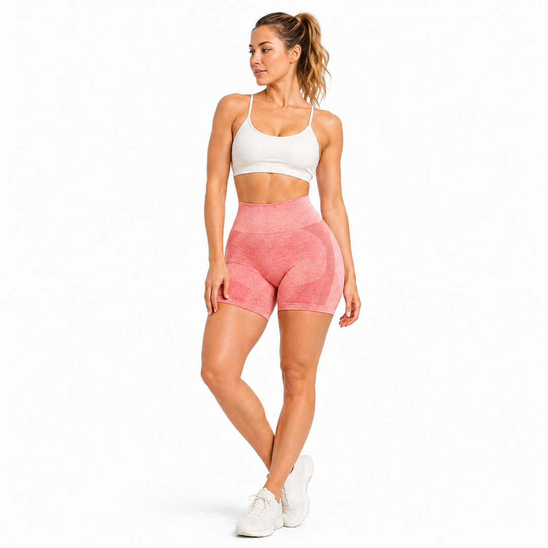Coral seamless gym shorts lifestyle pose on female model