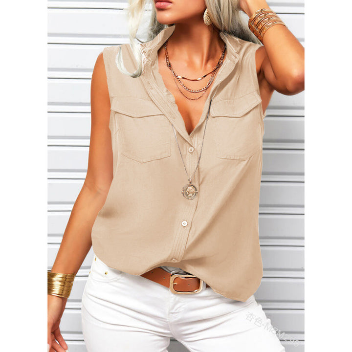Woman wearing a beige sleeveless shirt with white pants against a light background