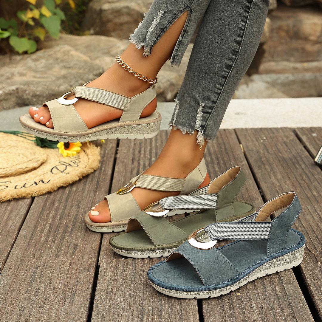 Elastic strap sandals for women with PU upper, rubber sole, flat heel and elastic-band wearing style for warm-season styling.