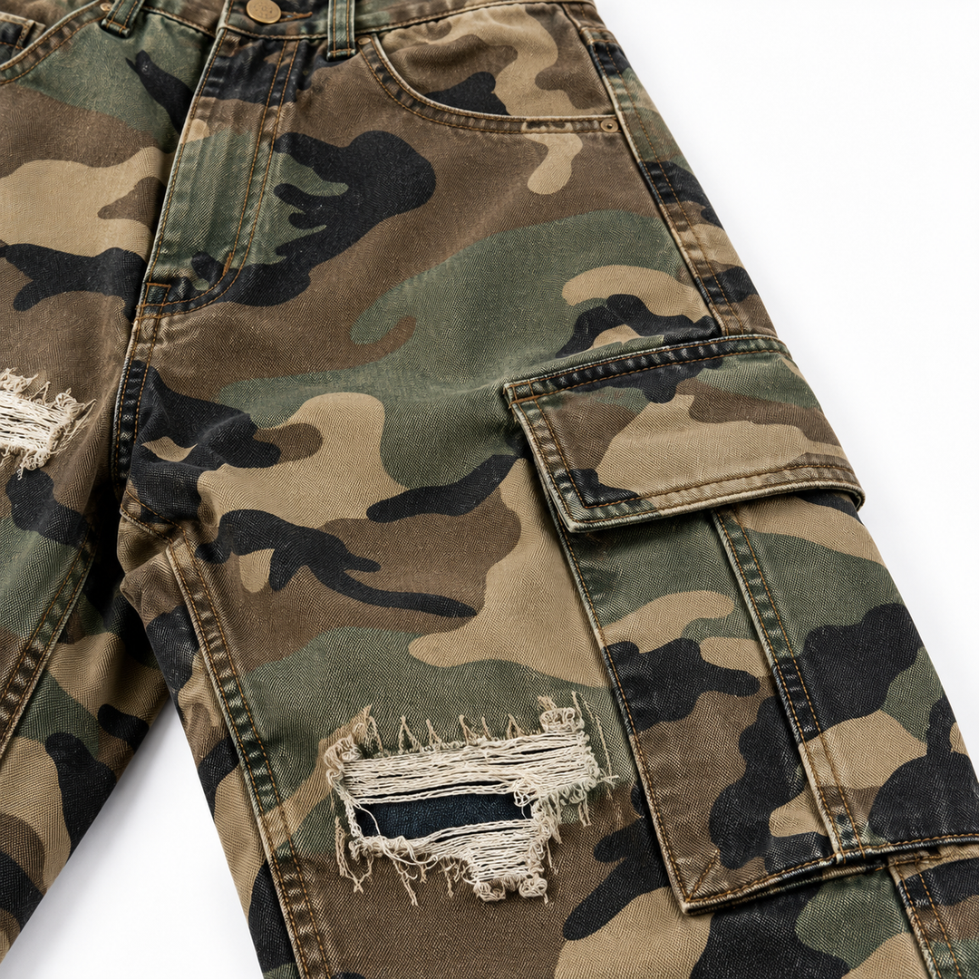 Camouflage cargo pants close-up showing cargo pocket, stitching and distressed detail