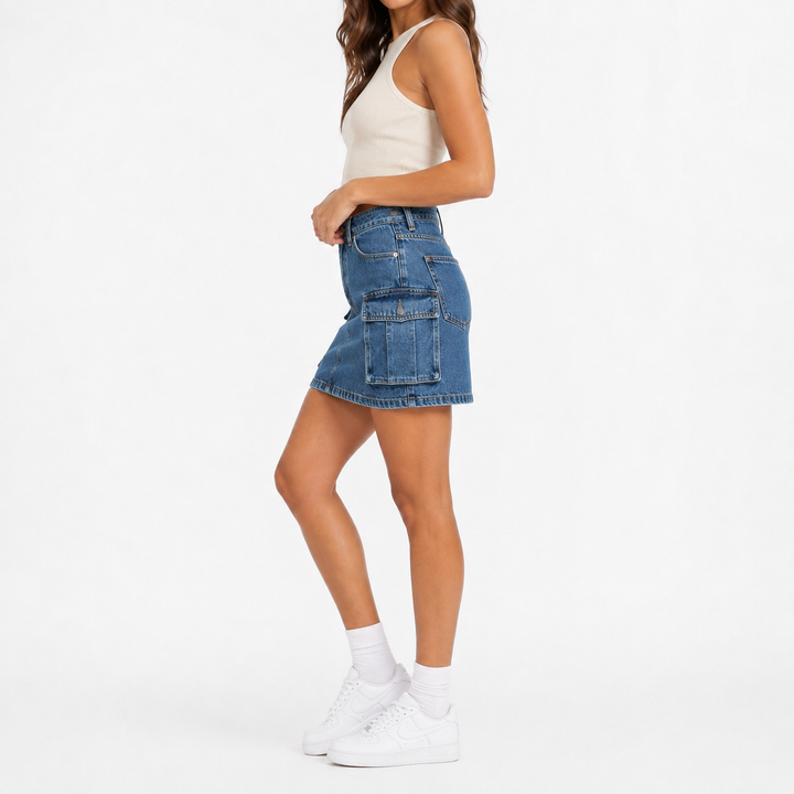 Cargo denim skirt side fit view showing utility pocket and silhouette