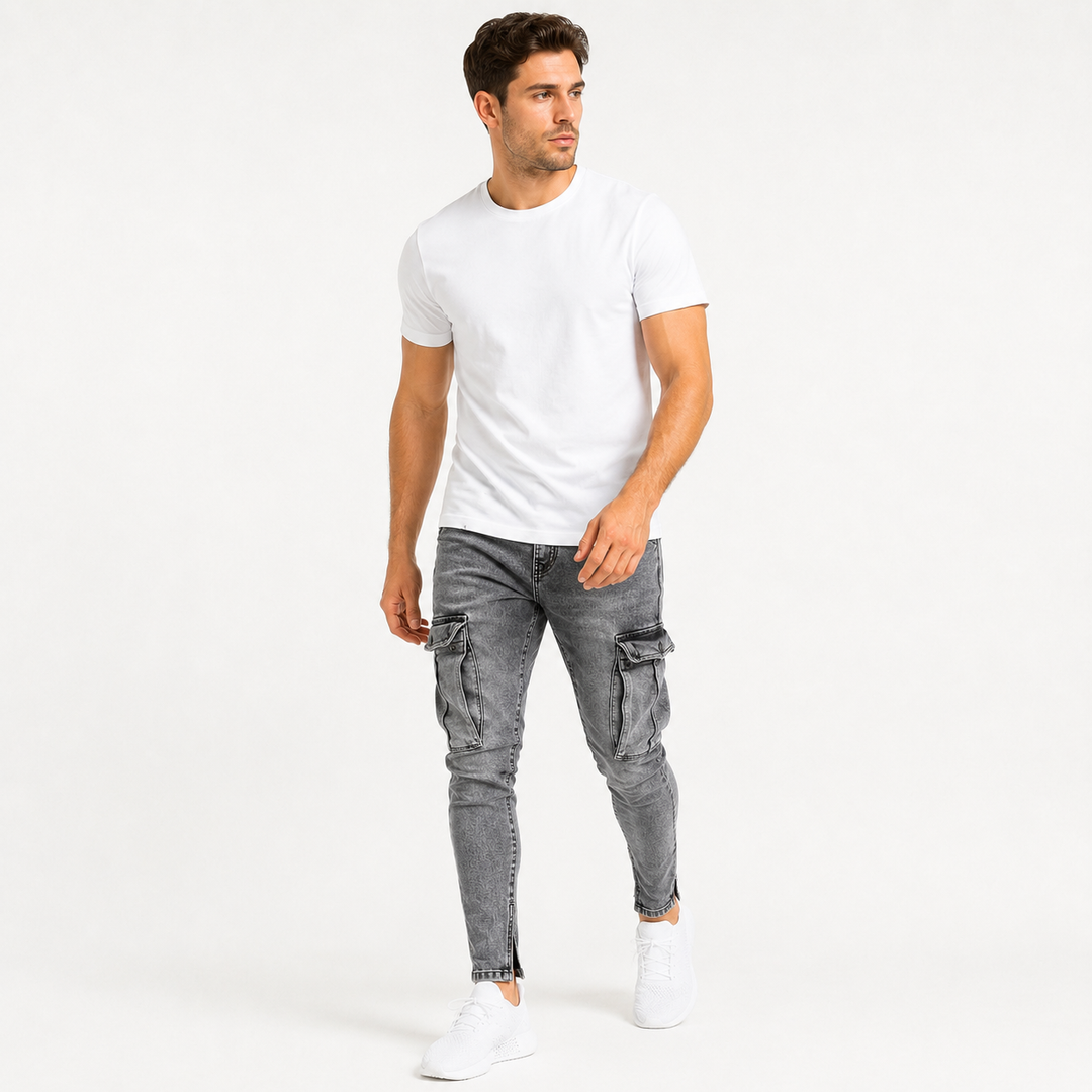 Washed gray cargo jeans for men on an adult male model in a natural walking pose, showing the tapered fit and thigh cargo pockets.