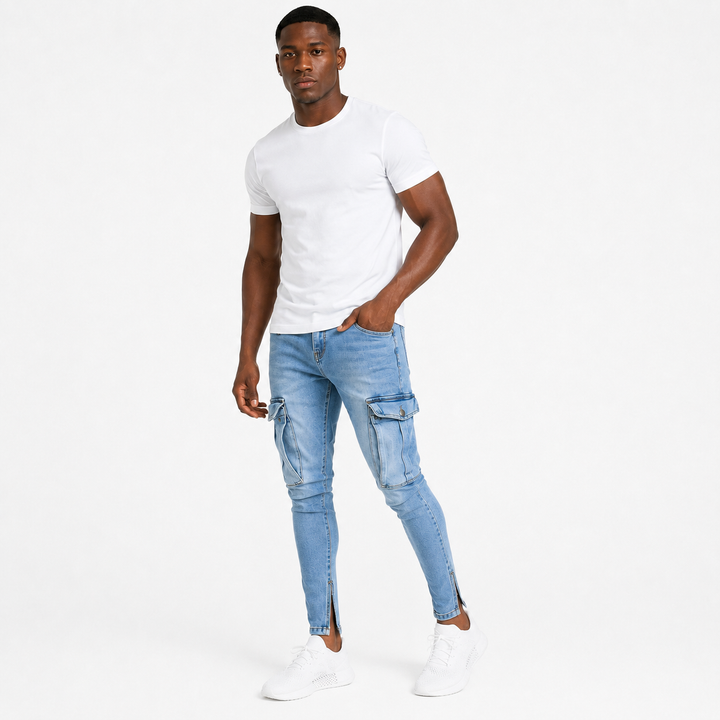 Washed light blue cargo jeans for men shown in a three-quarter studio view on an adult male model with prominent cargo pocket styling.