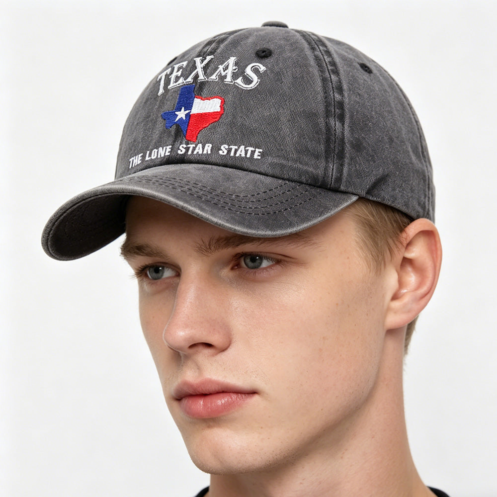 Close-up of Lone Star State embroidery on soft washed cotton with textured stitching detail.