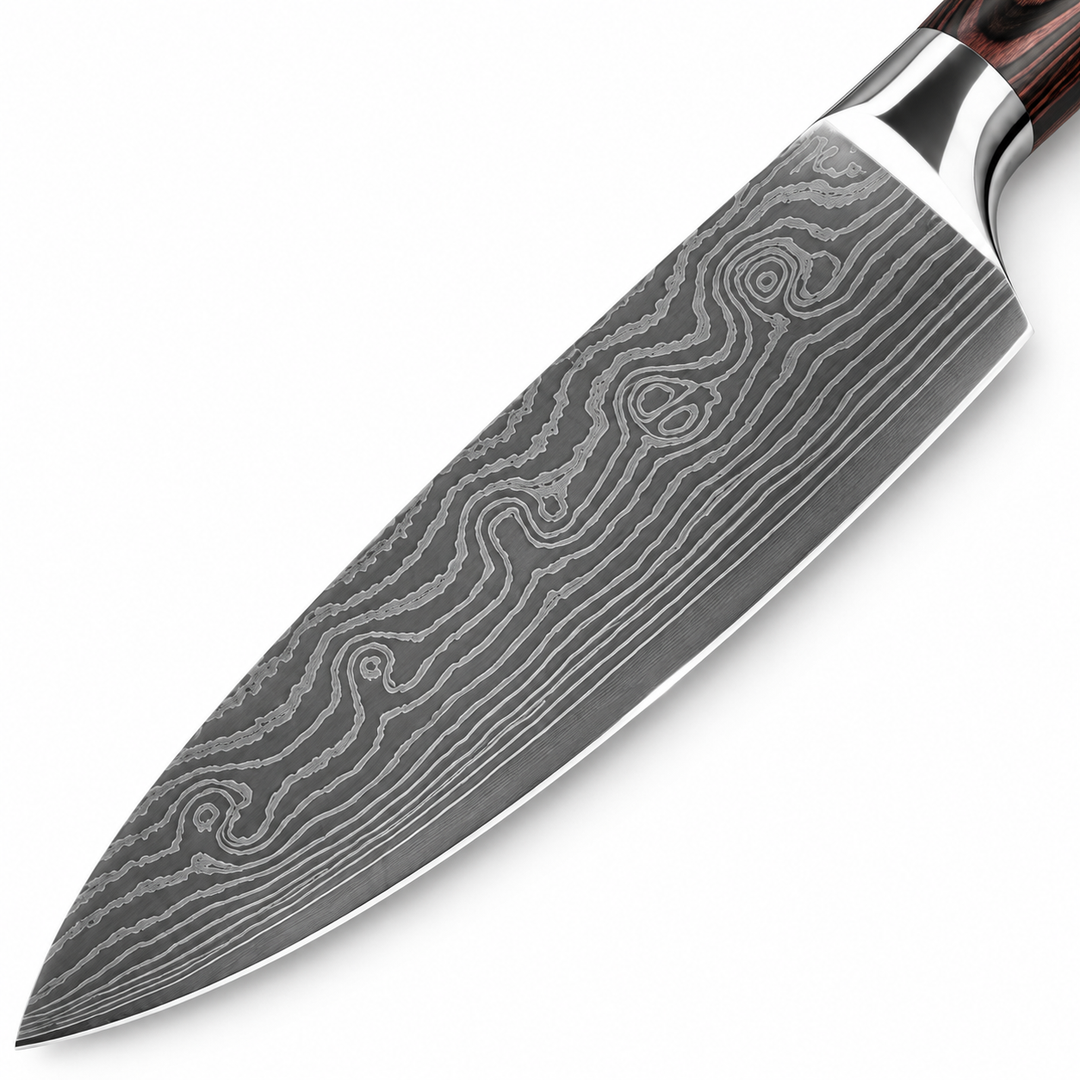 Close-up of patterned chef knife blade highlighting the visible etched-style surface design