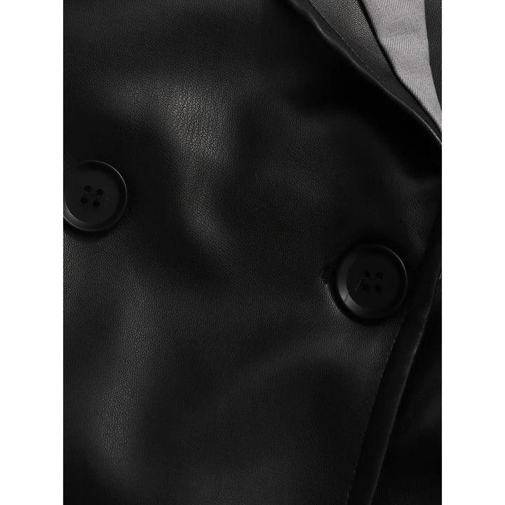 Close-up of the CHICEVER colorblock jacket showing two dark buttons and visible black surface texture