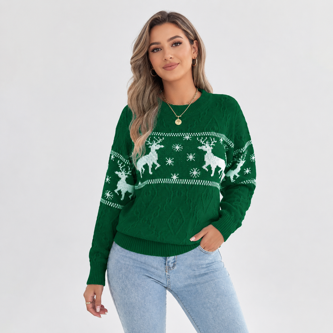 Women's green cable-knit Christmas sweater on model