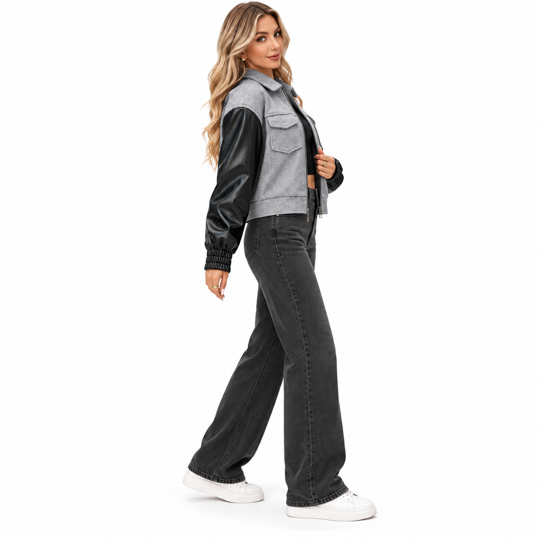Light gray and black zip-up jacket shown from the side on a full-body model
