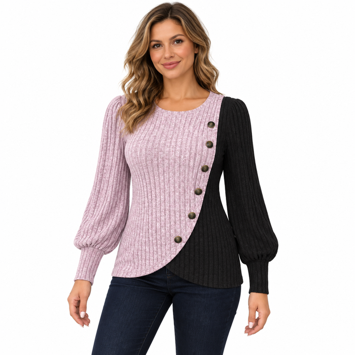 Pink and black ribbed knit top with six decorative side buttons, front view on a white background