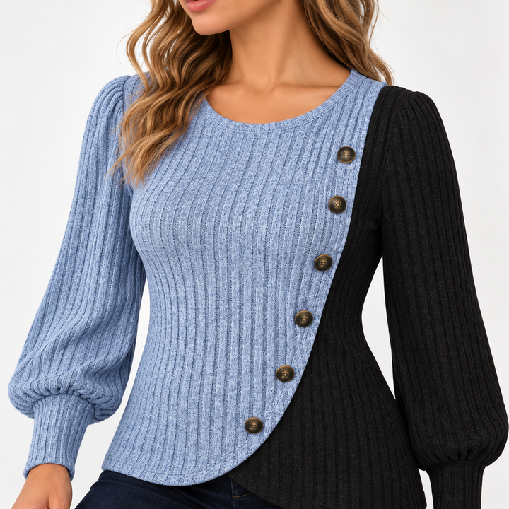 Sky blue ribbed knit top, close view of the round neckline, gathered sleeves and decorative buttons