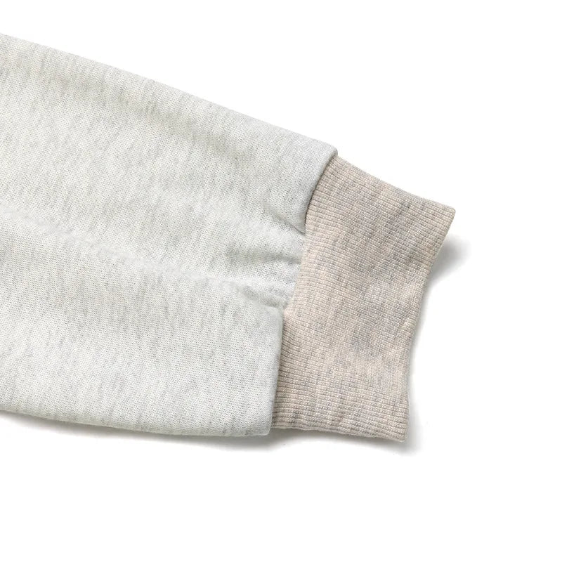 "cropped sweatshirt exposed shoulder balanced proportions styling