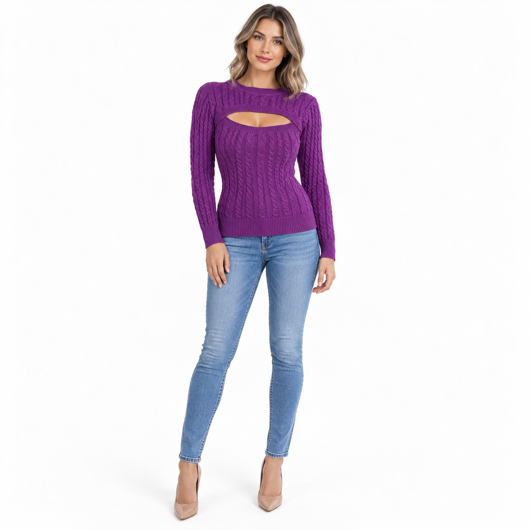 Purple cutout sweater on a full-length adult model, showing cable knit, a crew neck and long sleeves with blue jeans on white