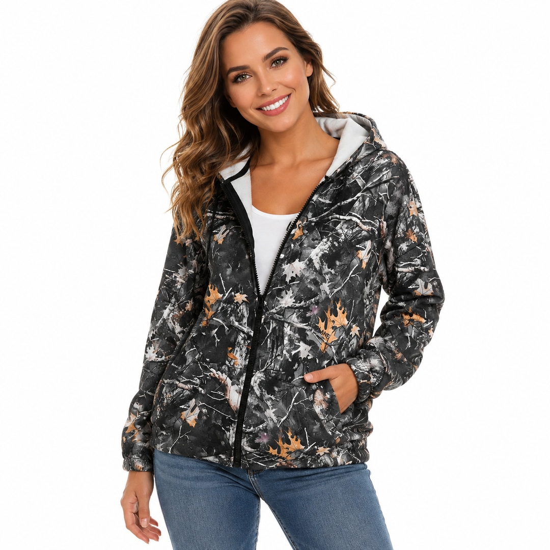 Polyester zip hoodie for women with pockets and slight stretch, made for simple styling and daily movement.