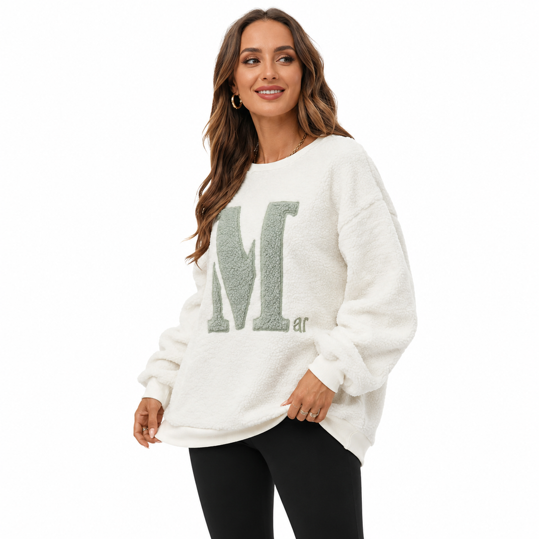 Fleece sweatshirt for women with plush interior, classic round neck and relaxed fit for effortless everyday outfits wear now!